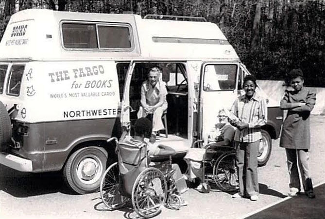 Historical photo of early bookmobile van